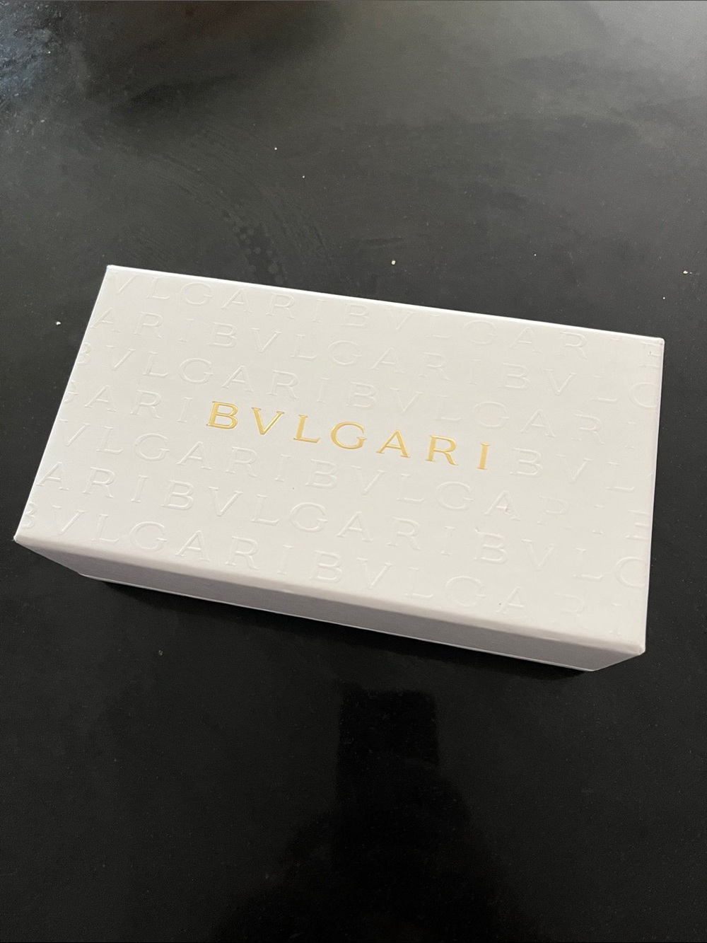Bulgari box that fits sunglasses in a case with Gold Logo